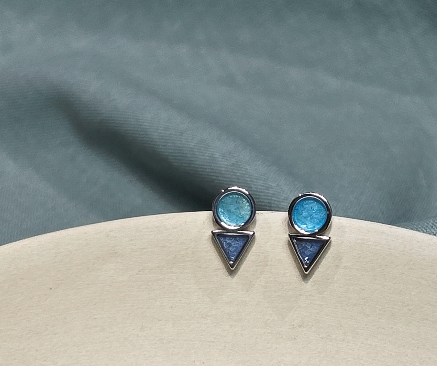 The circle and triangle studs
