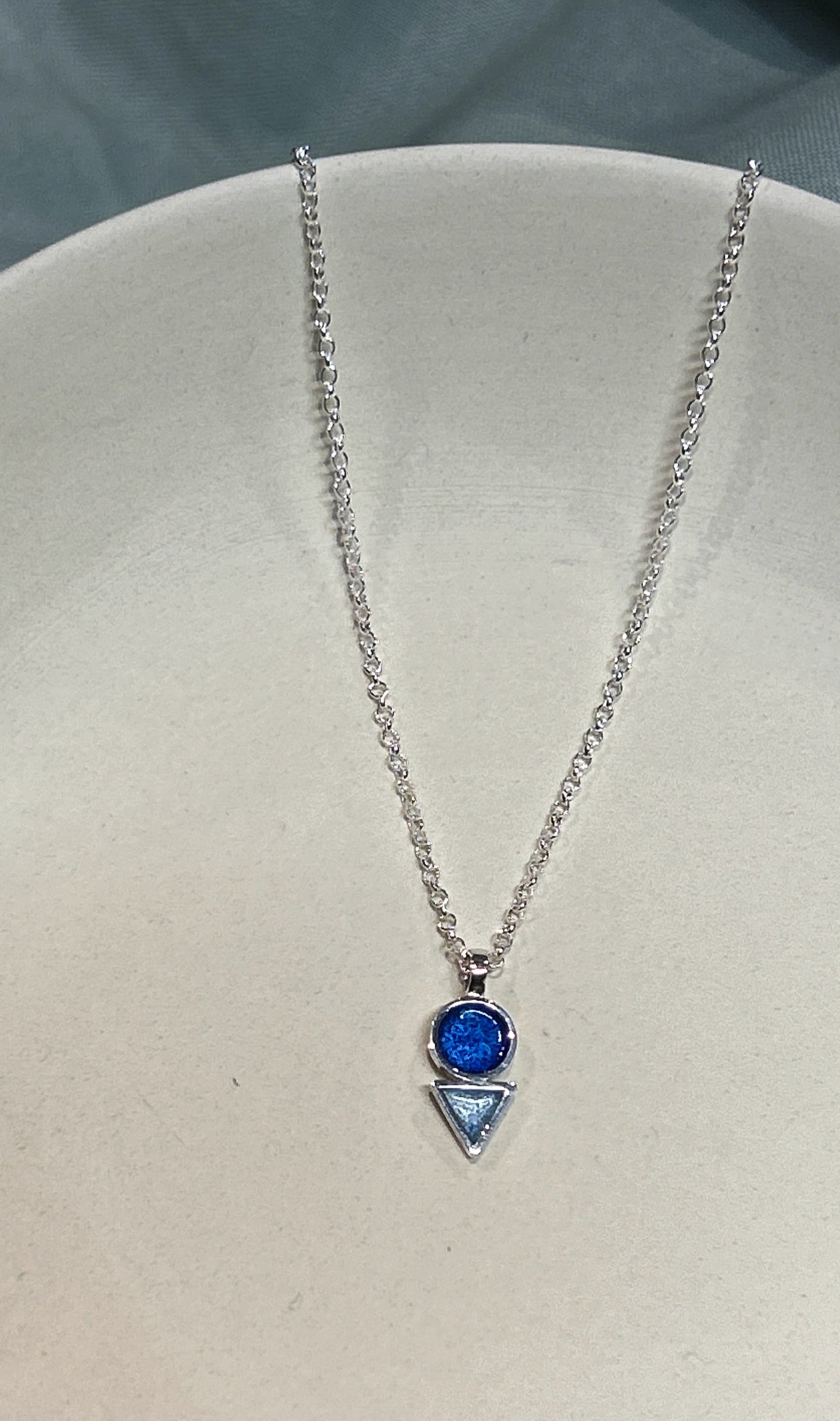 The circle and triangle necklace