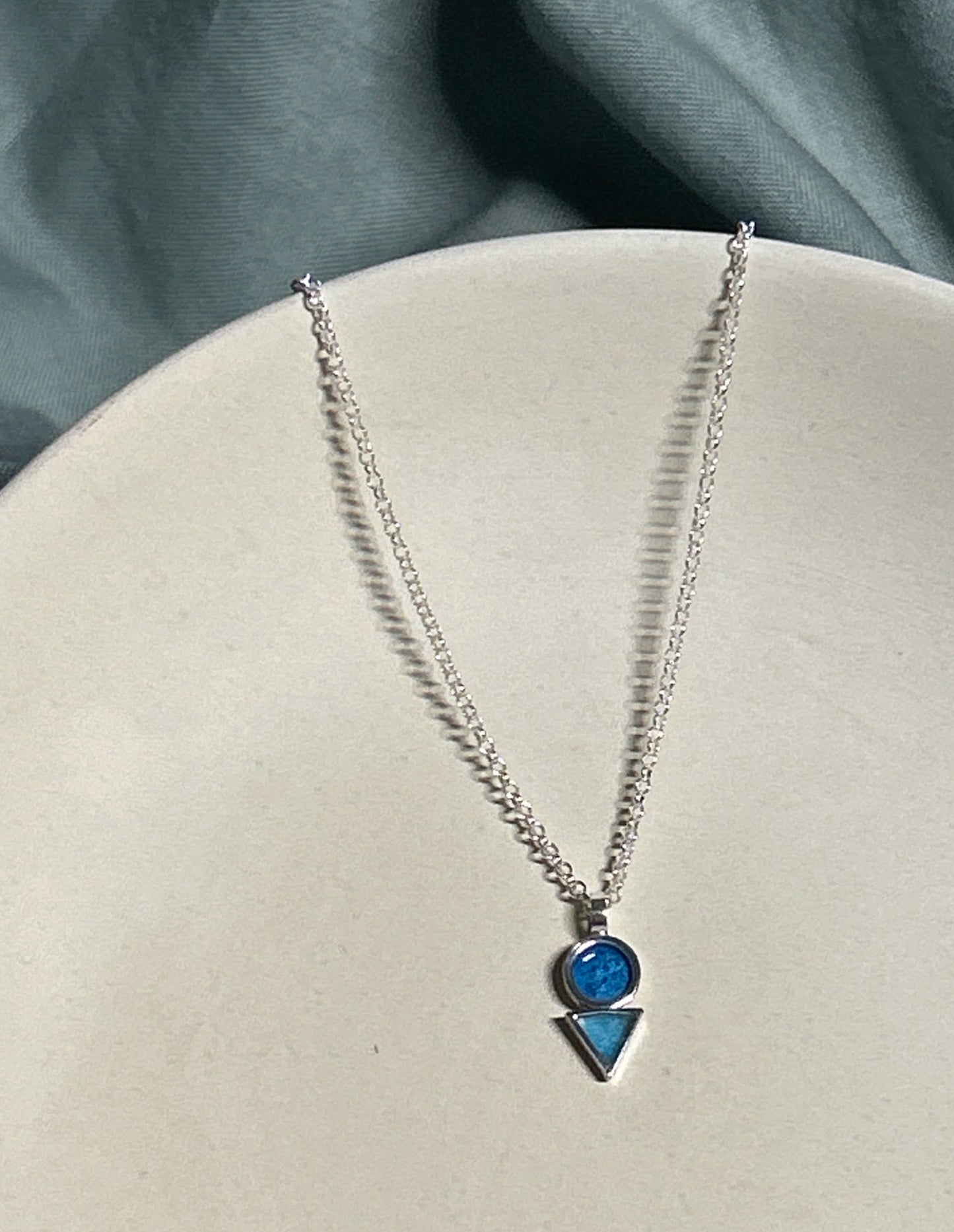 The circle and triangle necklace